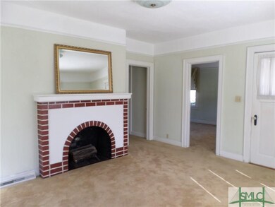 Living room looking back towards dining room and f