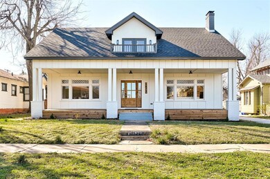 View of front facade featuring covered porch and a