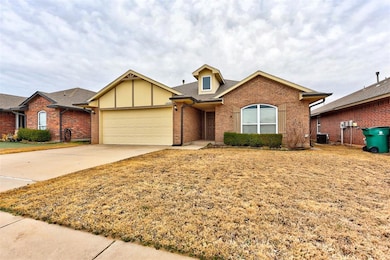 View of front of home featuring brick siding, an a