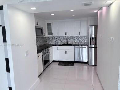 Quadomain Valencia Tower unit 601, Hollywood, FL 33019 - photo 3