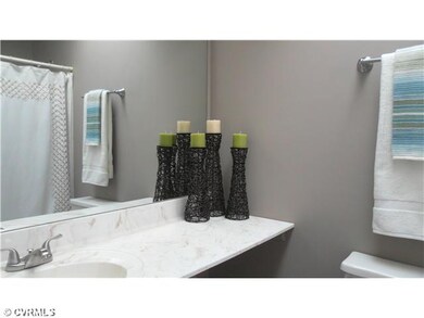 Other - Full bath with skylight. New flooring, light fixture, and faucet.