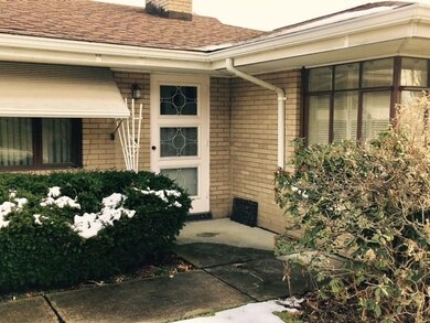 Sidewalk from Driveway leading to Front Entrance.