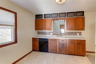 Kitchen overlooking second living area.
