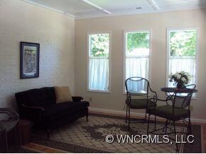 Adorable Sunroom or Den