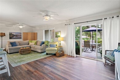 Large, open living space with access to back deck.