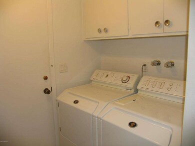 Inside laundry with shelves