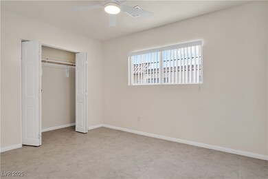 Unfurnished bedroom with a closet, baseboards, and
