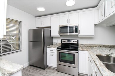 2566 Kings Lake Blvd unit 104, Naples, FL 34112 - photo 4