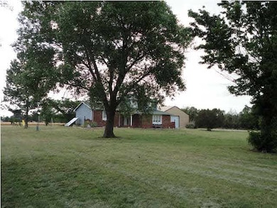 View of house from the SE corner, 77th and Beuna V