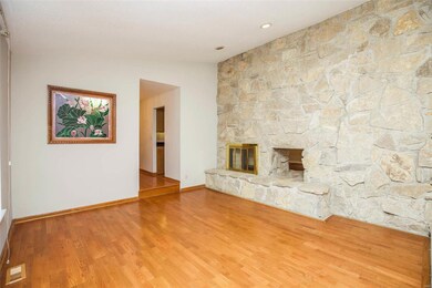 Oak flooring and woodburning fireplace