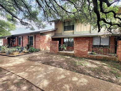 View of front of property featuring brick siding