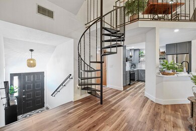 Fancy spiral stairs to the loft area