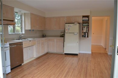15x14 Eat-in kitchen with wood flooring, new stain