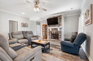 Living room offers recessed lighting and ceiling fan for style and comfort.    561 Tacoma Dr Clarksville TN 37043