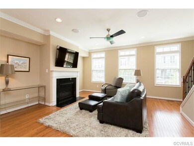 Family room with hardwood floors, neutral interior