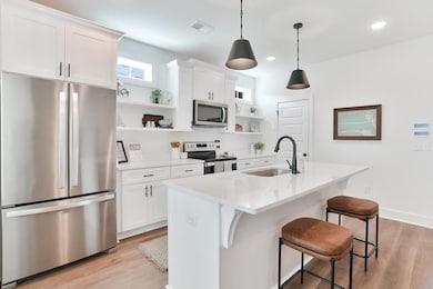 The Toby plan by Holland Homes LLC. This is a prev
