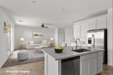Kitchen featuring stainless steel appliances, a si