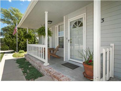 Front Porch view and new storm door.