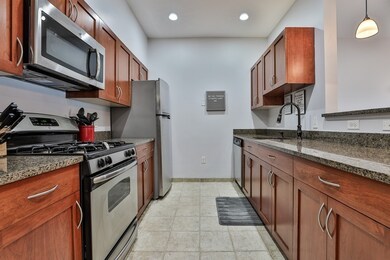 Spicket Commons unit 313, Methuen, MA 01844 - photo 5