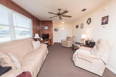 Living room with large windows.