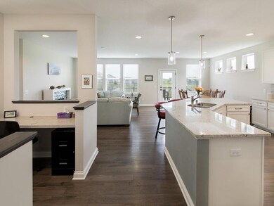 Open concept with an office space tucked away off the kitchen