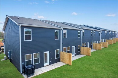 Rear view of property with a patio area, central a