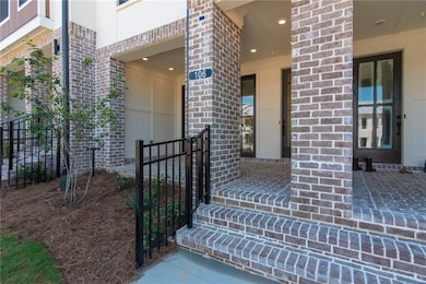 Front Entry featuring a fenced private yard with Sliding Glass Door .Not the actual building . Previously built Barnsley I