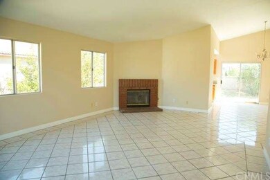 The Living Room with Fireplace.