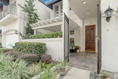 This home is 1 of only 2 of the villas with a private locked gated entrance leading into a charming patio area with a pergola and shaded by a mature tree.