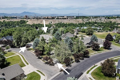 2 Driveways; frontage faces SW.  Backyard views to NE of USU on the other ridge.