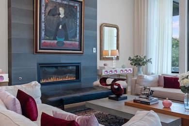 Living area featuring a large fireplace