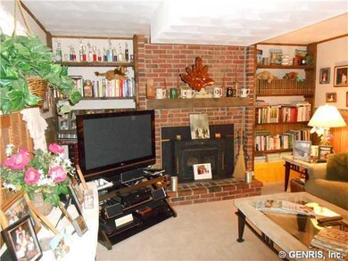 Family Room. With bookshelves and floor to ceiling