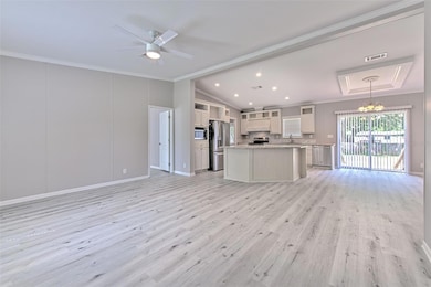 View of Living, Kitchen, Dining from Entry