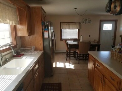 Large eat in kitchen with center island seating as
