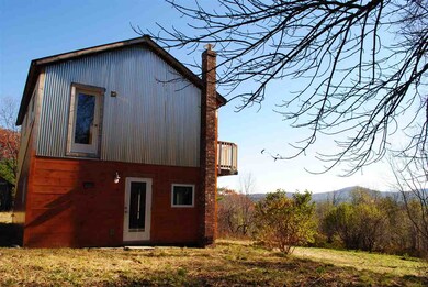 Metal and wood construction reminiscent of a barn.