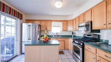with center island and Stainless Appliances leads 