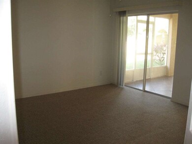 Master Bedroom sliders to tiled porch