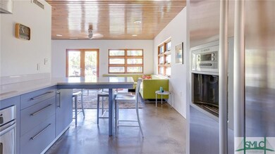 The sleek and polished interiors reflect natural l
