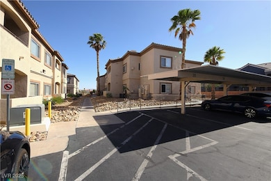 Covered parking lot featuring a residential view