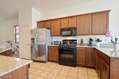 Clean kitchen with 2 bar seating areas