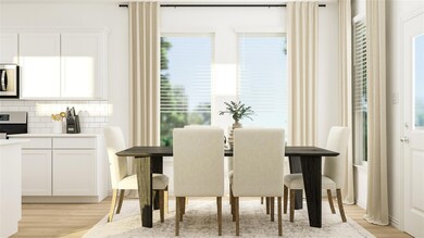 Dining area featuring light wood-type flooring