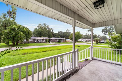 Exterior space featuring covered porch