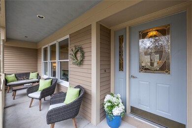 Covered front porch, perfect for morning coffee wi