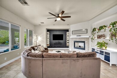 Living room featuring light tile patterned floors,