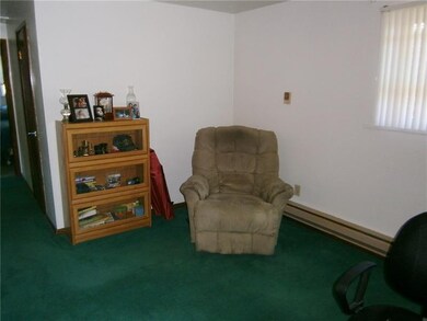 ANOTHER VIEW OF THE LIVINGROOM FROM THE FRONT DOOR