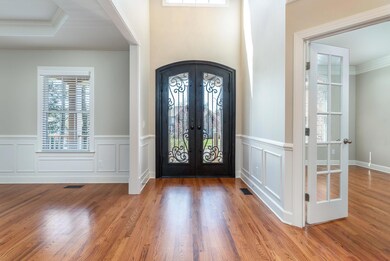 Grand entry with beautiful Iron Door Entry