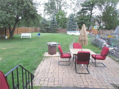 Lot is fully fenced, includes Patio & A/G Pool.