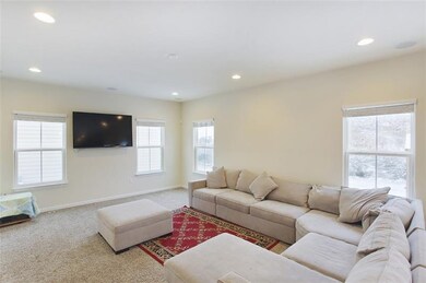 An extremely large Family room with lots of window