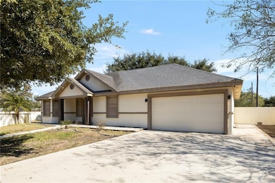 View of front of house featuring stucco siding, fence, concrete driveway, a shingled roof, and a garage