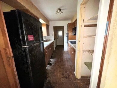 Kitchen with black appliances